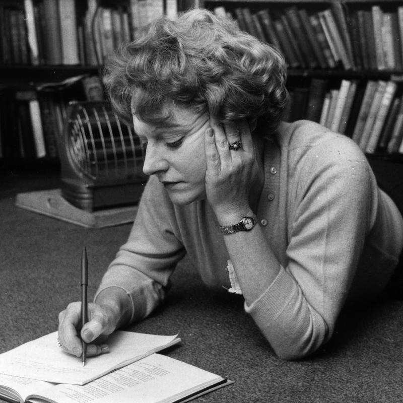 Author Muriel Spark writing 
