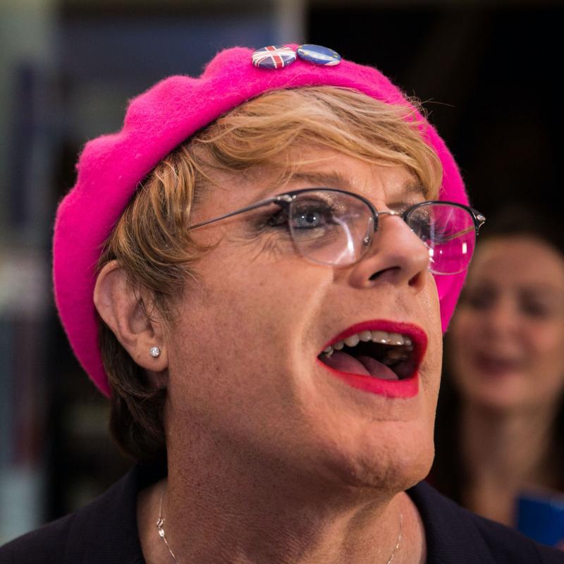 Comedian Eddie Izzard wears a pink beret